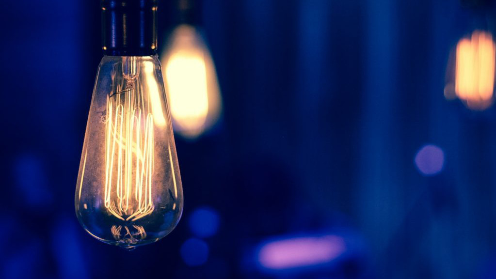 selective focus photography of light bulb